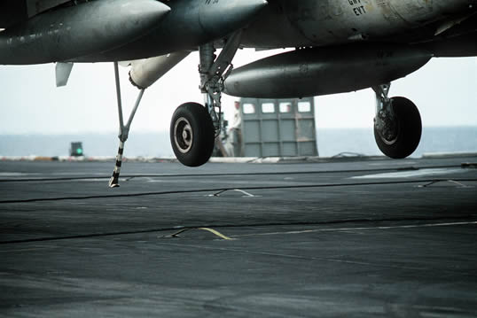 A Grumman A-6 Intruder about to catch the #3 wire